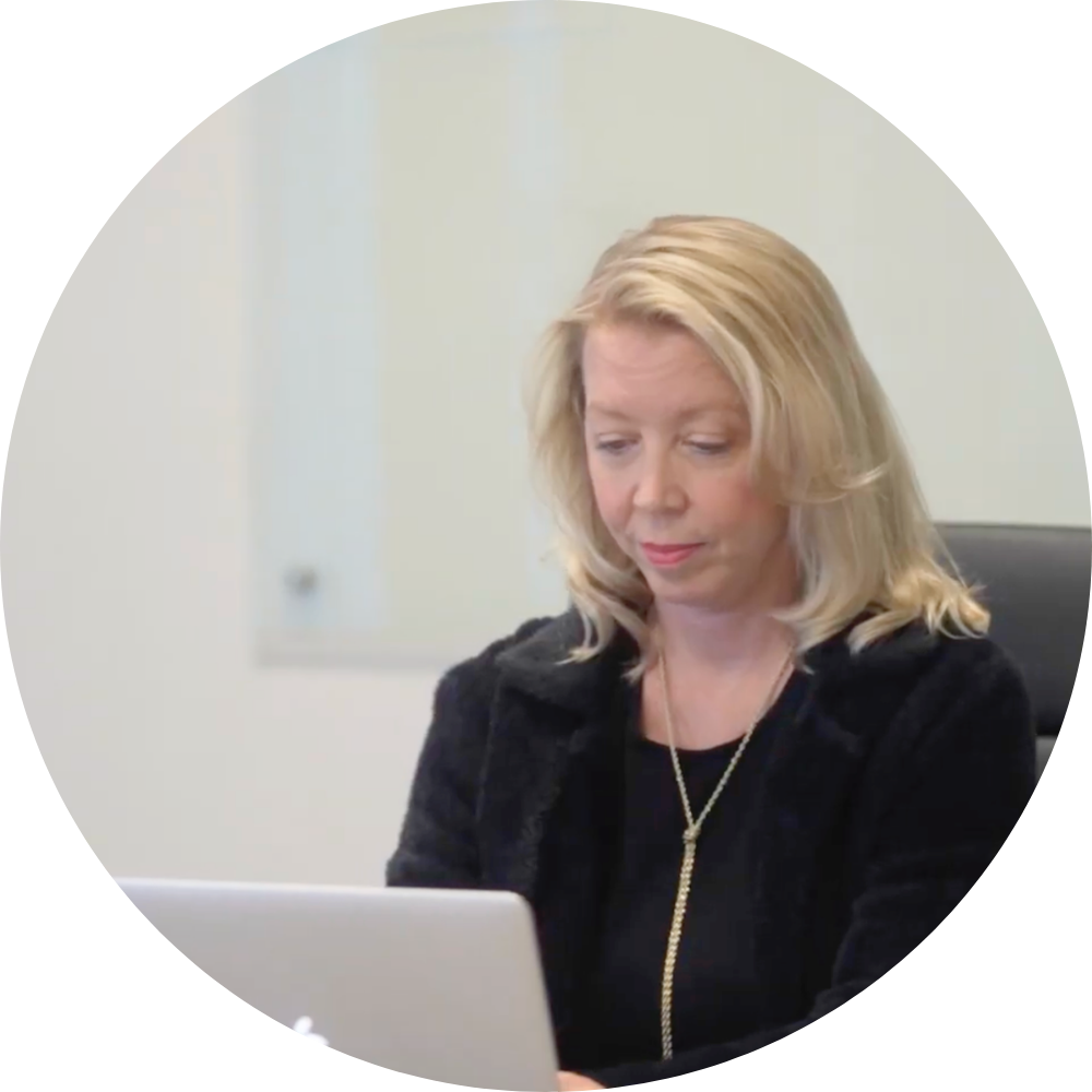 Sarah Piazza looking at the laptop